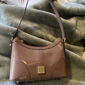 Dooney and Bourke patent baguette bag.